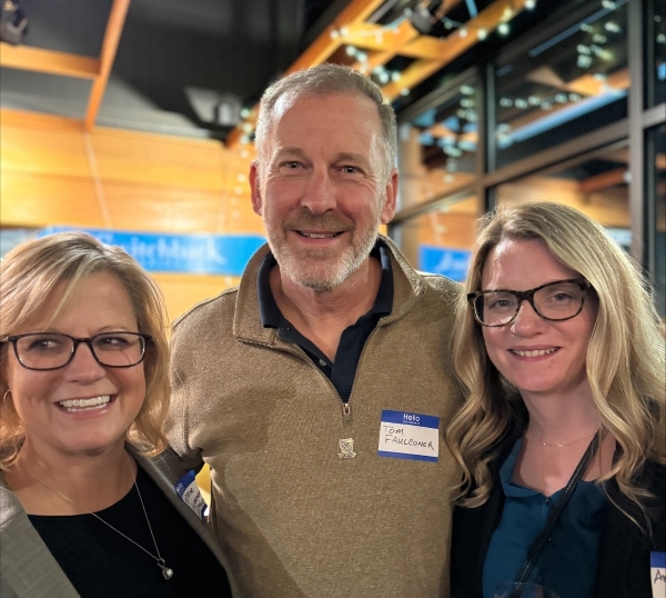 Butler University Professor Tom Faulconer (center) in Burlington