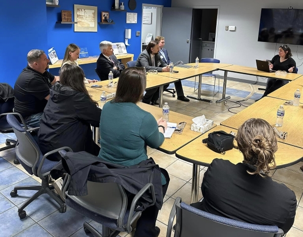 Dep. Commissioner Long, Vt. Dept. of Labor representatives and others meet at Velan Valve.