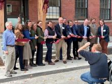 Ribbon cutting for Dewitt Block